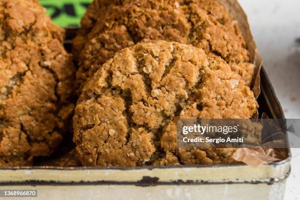 anzac biscuits - anzac biscuit stock pictures, royalty-free photos & images