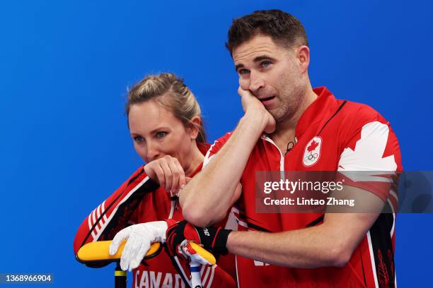 John Morris and Rachel Homan of Team Canada look on as they compete against Team Australia during the Curling Mixed Doubles Round Robin on Day 2 of...