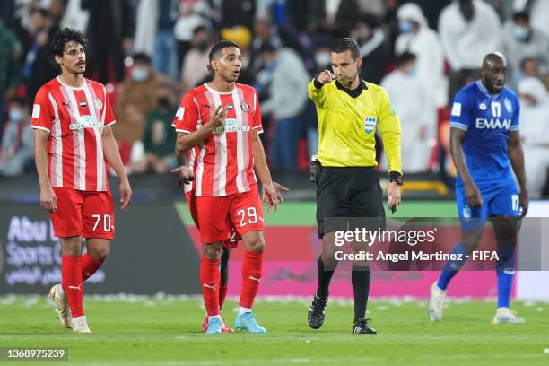 Victor Sa of Al Jazira complains to Referee Cesar Ramos after Al Hilal scored their second goal during the FIFA Club World Cup UAE 2021 2nd Round...