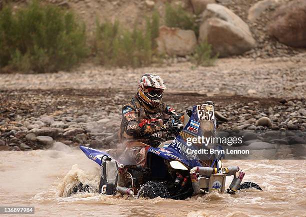 Marcos Patronelli of Argentina and Yamaha Racing rides across a river during stage eleven of the 2012 Dakar Rally from Arica to Arequipa on January...