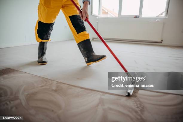 professional flooring master - flooring contractor stock pictures, royalty-free photos & images