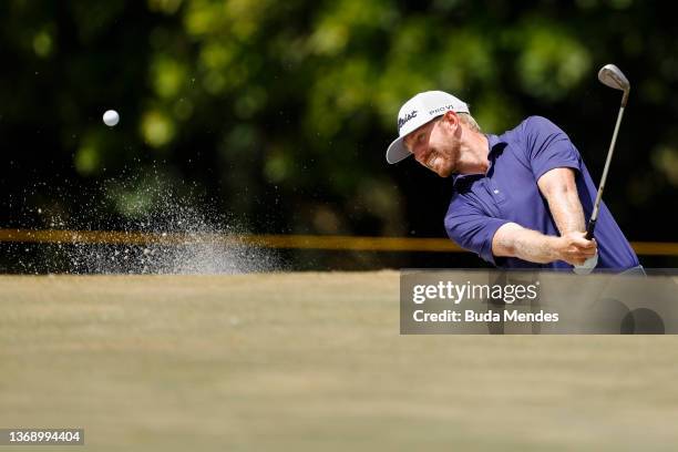 Jimmy Stanger of the United States plays a shot on the third hole during the final round of The Panama Championship at Panama Golf Club on February...