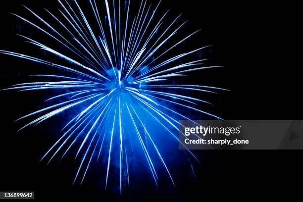 blue fireworks explosion - fireworks stock pictures, royalty-free photos & images