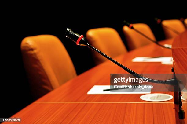 round conference table - leather conference room chairs stock pictures, royalty-free photos & images