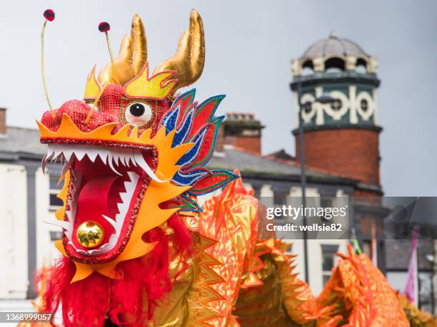 chinese dragon close up - chinese new year dragon dance stock pictures, royalty-free photos & images