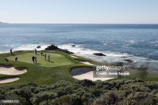 General view of the seventh hole as Patrick Cantlay of the United States, Chief Executive Officer of Goldman Sachs David Solomon, Tom Hoge of the...