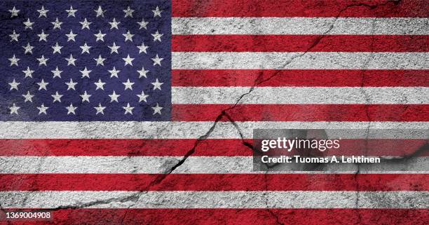 full frame photo of a weathered american (united states of america or usa) flag painted on a cracked wall. - american flag jpg stock pictures, royalty-free photos & images