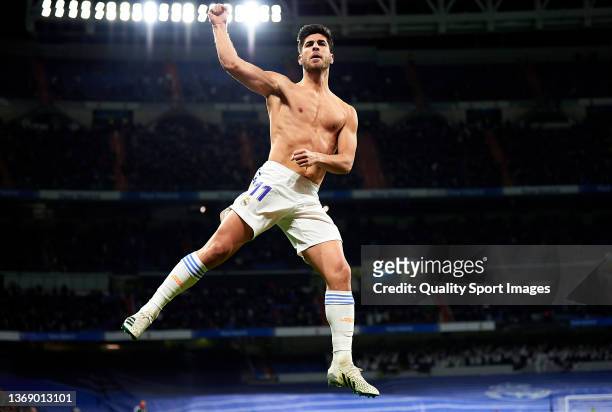 Marco Asensio of Real Madrid celebrates after scoring their side's first goal during the La Liga Santander match between Real Madrid CF and Granada...