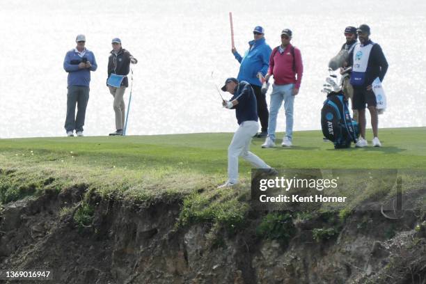 Jordan Spieth of the United States plays his second shot on the eighth hole during the third round of the AT&T Pebble Beach Pro-Am at Pebble Beach...