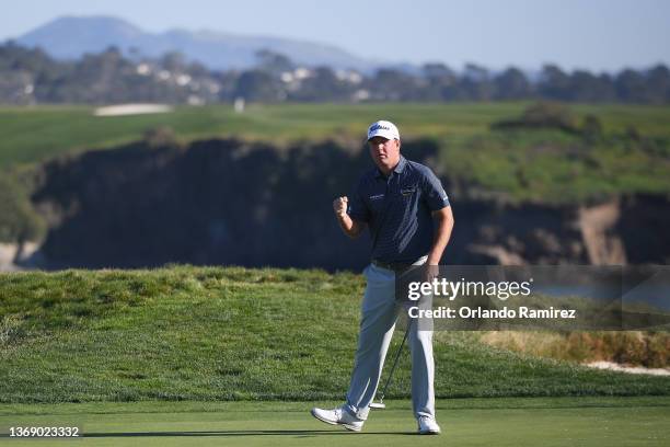 Tom Hoge of the United States celebrates his birdie on the 17th green during the final round of the AT&T Pebble Beach Pro-Am at Pebble Beach Golf...