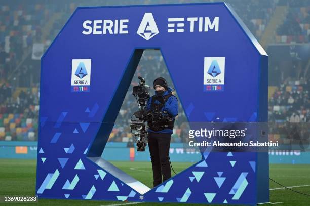 Cameramen behind the back drop of the series a during the Serie A match between Udinese Calcio and Torino FC at Dacia Arena on February 06, 2022 in...
