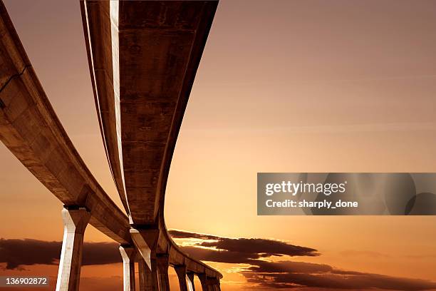 xxl elevated roadway at sunset - amazing architecture stock pictures, royalty-free photos & images
