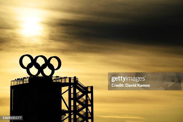 The Olympic Rings logo are seen on the top of a tower as the sun rises prior to the Women's Freestyle Skiing Freeski Big Air Qualification on Day 3...