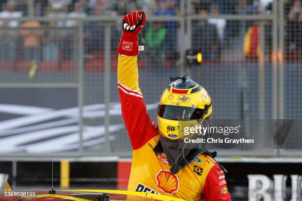 Joey Logano, driver of the Shell Pennzoil Ford, celebrates after winning the NASCAR Cup Series Busch Light Clash at the Los Angeles Memorial Coliseum...