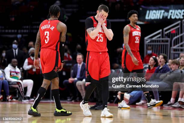 Garrison Mathews brings his hands to his face after a technical foul is called on Kevin Porter Jr. #3 of the Houston Rockets during the second half...