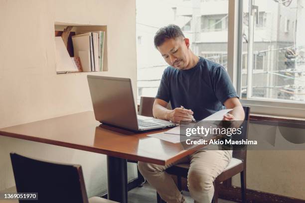 japanese business man teleworking from home - meeting board room stock pictures, royalty-free photos & images