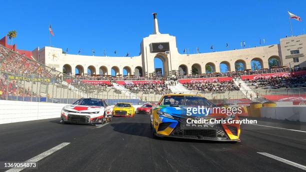 Kyle Busch, driver of the M&M's Toyota, paces the field prior to the start of the NASCAR Cup Series Busch Light Clash at the Los Angeles Memorial...