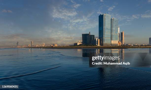 famous landmarks of karachi, clifton beach karachi on bright sunny day - karachi stock pictures, royalty-free photos & images