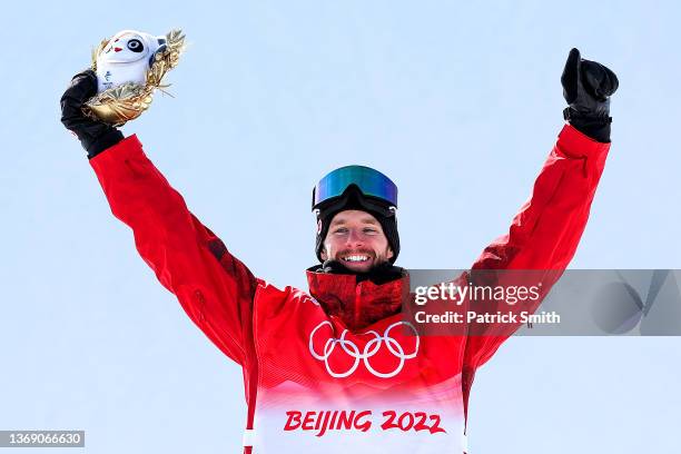 Gold medallist Max Parrot of Team Canada celebrates during the Men's Snowboard Slopestyle flower ceremony at Genting Snow Park on February 07, 2022...