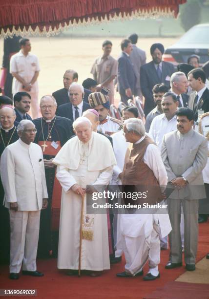 Pope John Paul II with Prime Minister Atal Behari Vajpayee and President KR Narayanan during a ceremonial arrival ceremony in the forecourt of the...