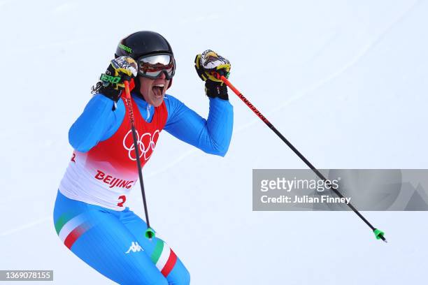 Federica Brignone of Team Italy reacts following her run during the Women's Giant Slalom 2nd run on day three of the Beijing 2022 Winter Olympic...