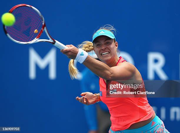 Angelique Kerber of Germany returs a shot to Mona Barthel of Germany during the singles semi final match on day six of the 2012 Hobart International...
