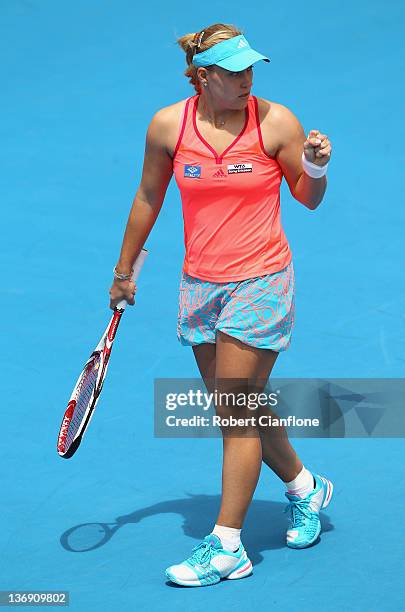 Angelique Kerber of Germany celebrates a point against Mona Barthel of Germany during the singles semi final match on day six of the 2012 Hobart...