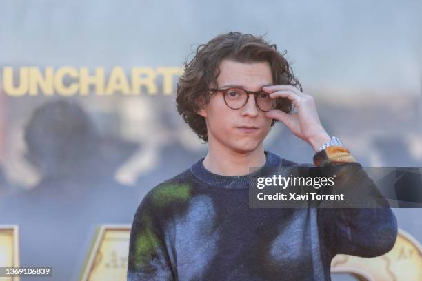 Actor Tom Holland attends the photocall during the presentation of the movie 'Uncharted' on February 07, 2022 in Barcelona, Spain.