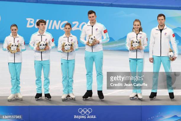 Gold medalists Kamila Valieva, Anastasia Mishina, Aleksandr Galliamov, Victoria Sanitsina, Nikita Katsalapov, Mark Kondratiuk of Team Russia...