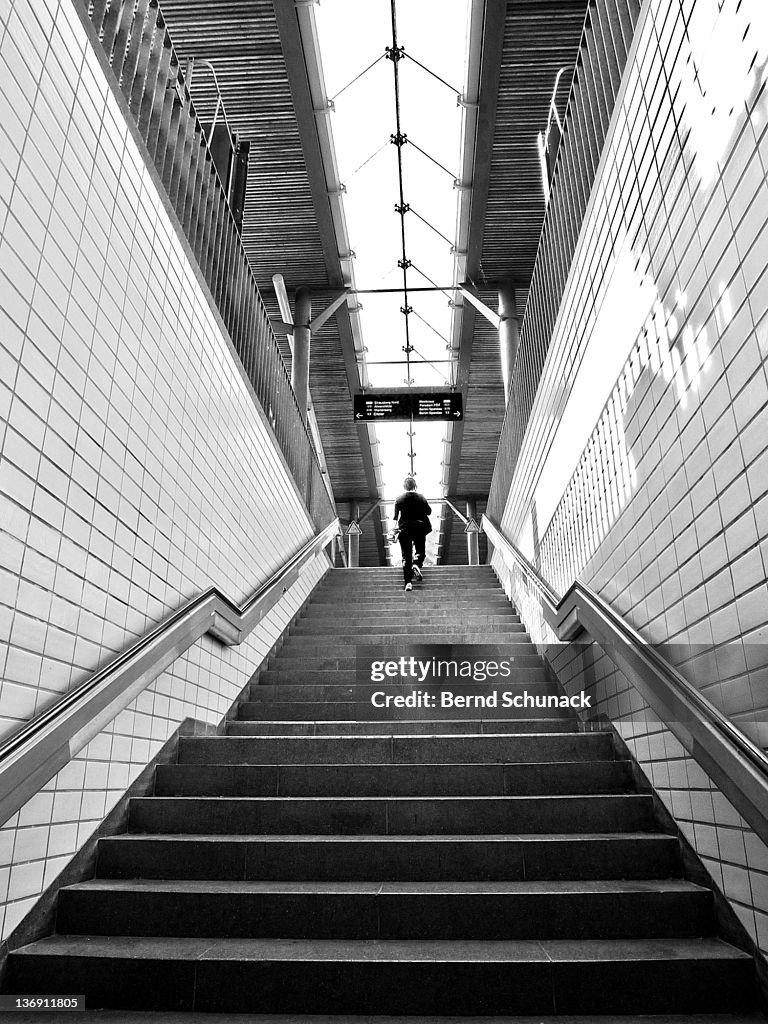 Person climbing stairs