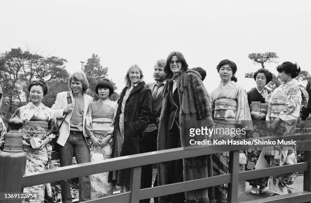 At a photo call in a Japanese garden at The New Otani hotel, Tokyo, Japan, March 1980. Bjorn Ulvaeus, Agnetha Faltskog, Benny Andersson, Anni-Frid...