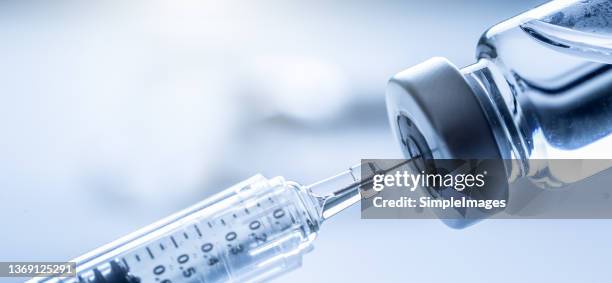 medical syringe with coronavirus vaccine. - slovakia vaccine stock pictures, royalty-free photos & images