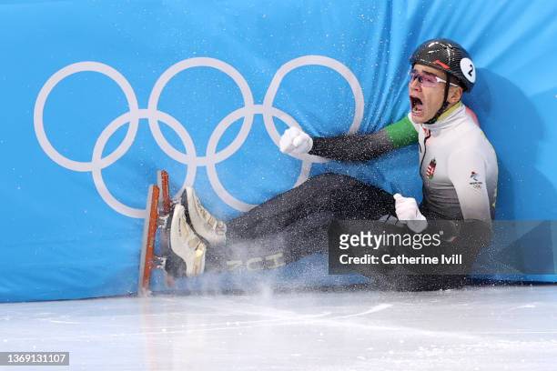 Shaolin Sandor Liu of Team Hungary reacts after a collision during the Men's 1000m Final A on day three of the Beijing 2022 Winter Olympic Games at...