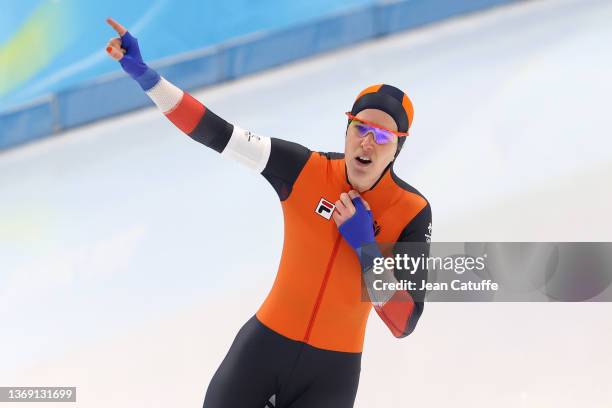 Gold medallist Ireen Wust of Team Netherlands celebrates during the Women's 1500m on day three of the Beijing 2022 Winter Olympic Games at National...