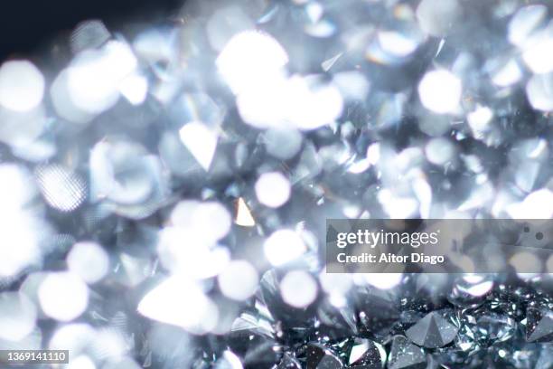 detail of a piece of jewelry with inlays that look like diamonds. - diamantförmig stock-fotos und bilder