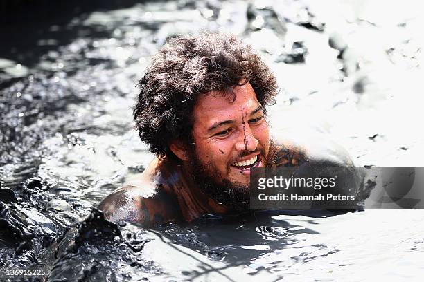 Rene Ranger of the Auckland Blues Super Rugby team competes in the Annual Naval Base Mud Run at the Devenport Naval Base on January 13, 2012 in...