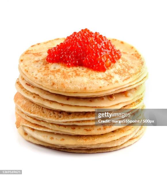 pancakes with red caviar,close-up of pancakes stacked on white background - maslenitsa stock pictures, royalty-free photos & images