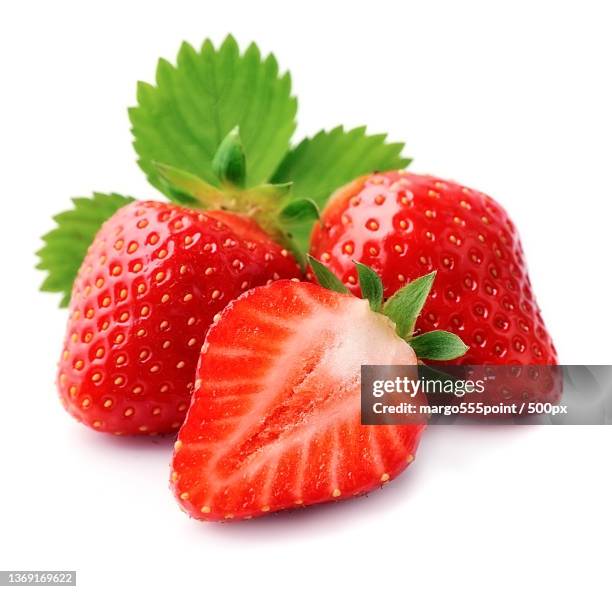 sweet strawberry,close-up of strawberries against white background - 正中縦断 ストックフォトと画像