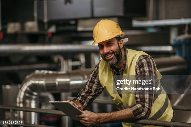 energy plant worker - working oil pumps stock pictures, royalty-free photos & images