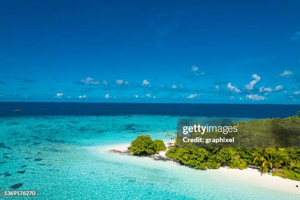 aerial drone view of tropical island with coral reef in ocean - indiska oceanen bildbanksfoton och bilder