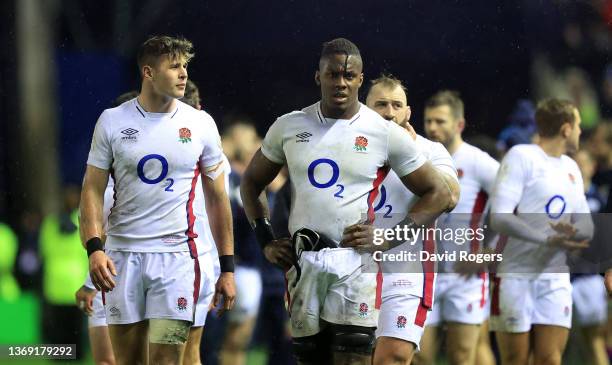 Maro Itoje and Freddie Steward of England walk off the pitch after their defeat during the Guinness Six Nations match between Scotland and England at...