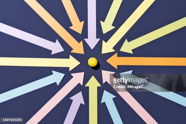 concentrated arrows focus on a sphere point - focus concept stock-fotos und bilder