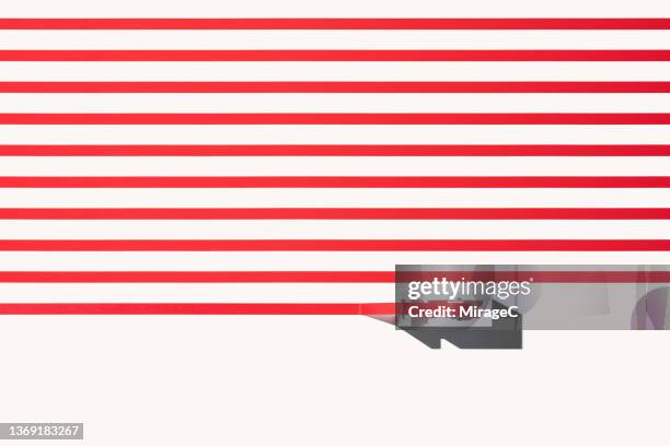 adhesive tape red lines made by tape dispenser - burocracia imagens e fotografias de stock