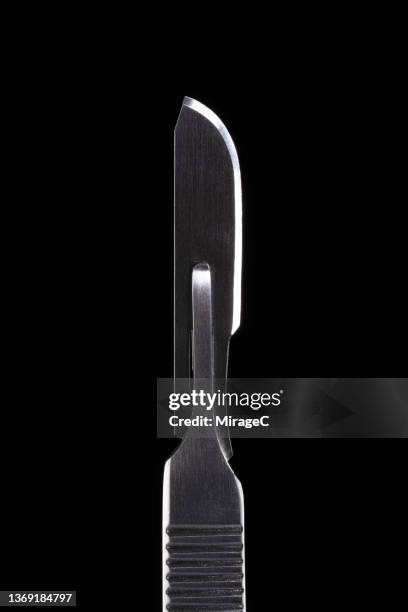 scalpel isolated on black - blade stock pictures, royalty-free photos & images
