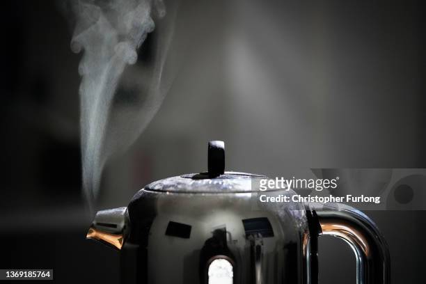 In this photo illustration a domestic electric kettle emits steam and vapour on February 07, 2022 in Knutsford, United Kingdom. The energy regulator...