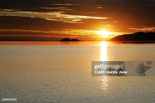 colorful lake sunset - northern michigan stock pictures, royalty-free photos & images