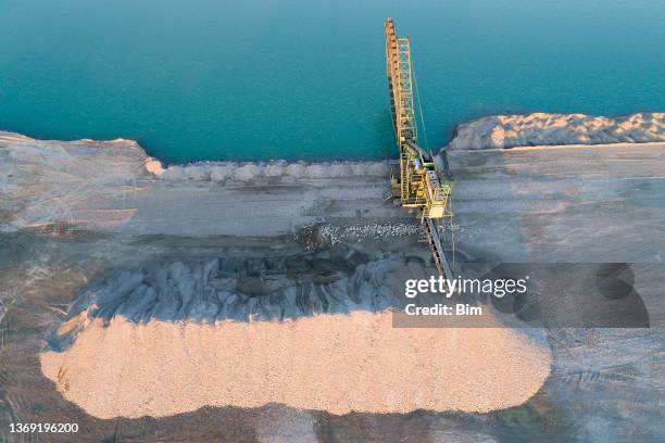 sand and gravel quarry conveyor belt, aerial view - stripping stockfoto's en -beelden
