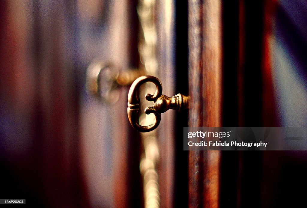 Shot of key to an antique cupboard