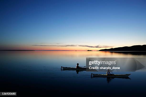 xxl twilight kayakers - michigan stockfoto's en -beelden