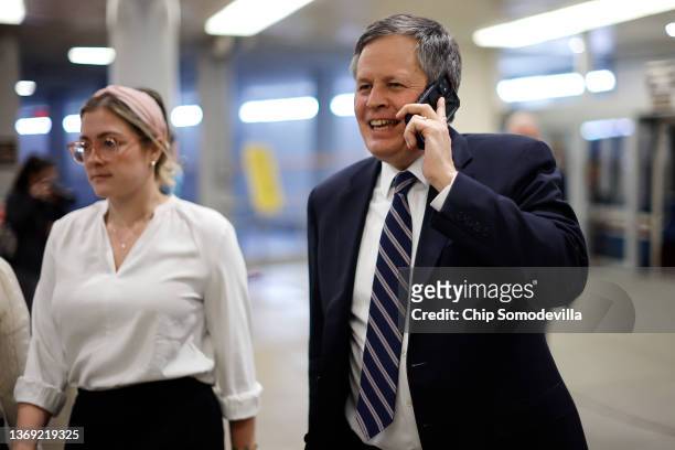 Sen. Steve Daines talks on the phone as he heads to the U.S. Capitol for votes on February 07, 2022 in Washington, DC. The House of Representatives...